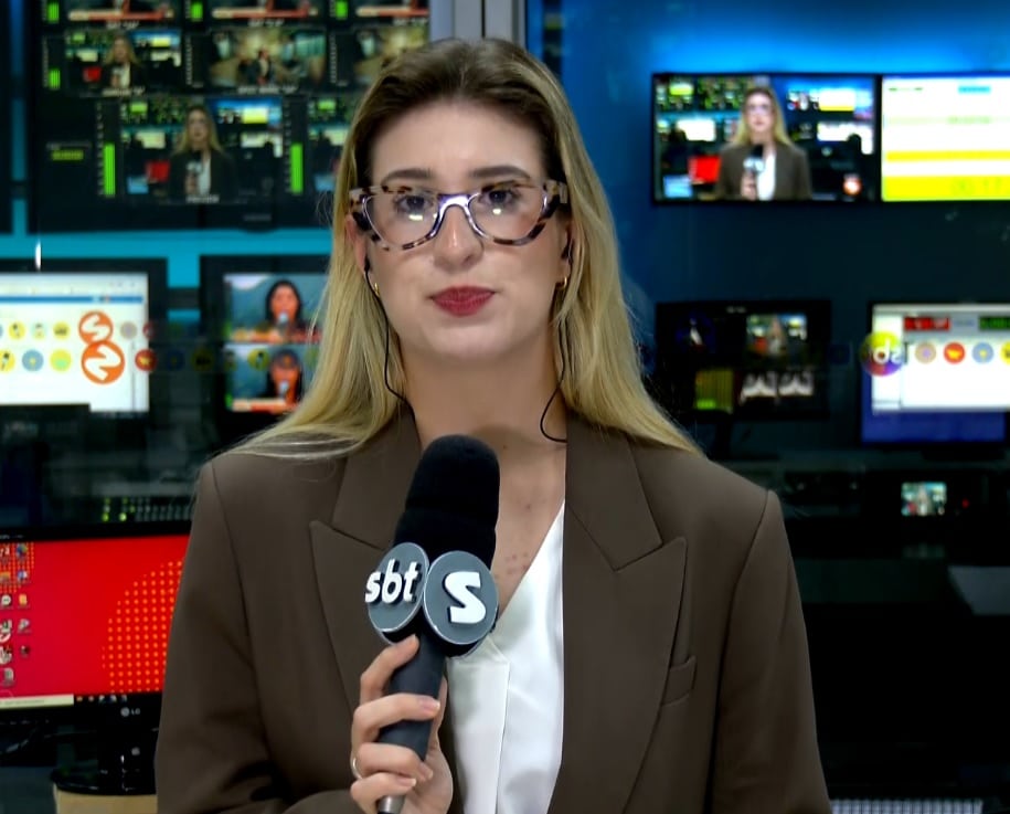 Repórter Nicole Bonentti falando sobre a dívida de Ana Hickmann.